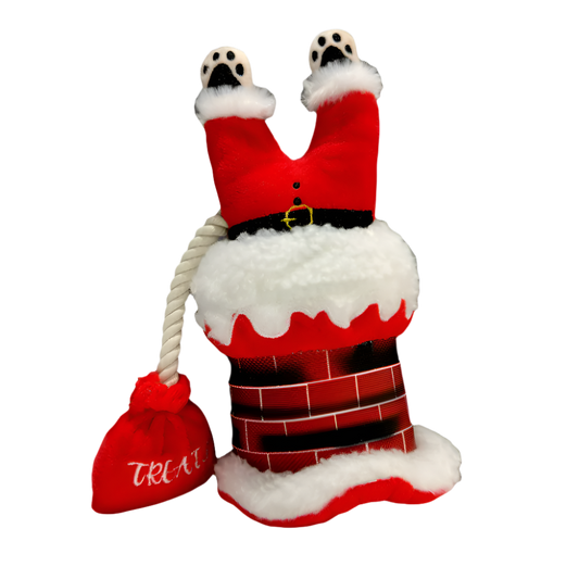 A festive Christmas-themed dog toy featuring Santa Claus stuck in a chimney.