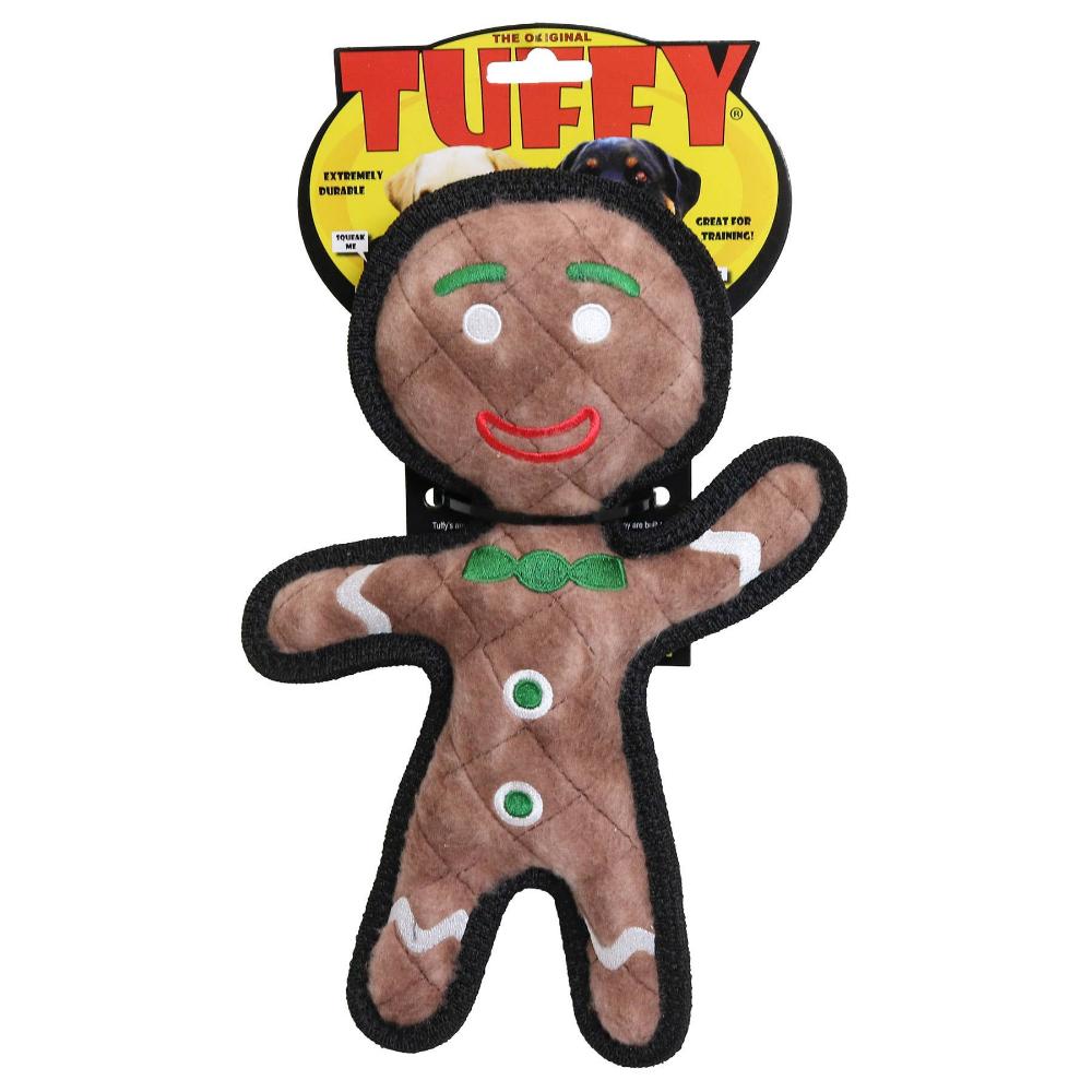 A festive gingerbread man dog toy with a friendly face.